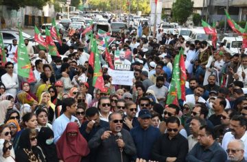 KARACHI, PAKISTAN, MARCH 31: Supporters of Pakistan Tehreek-e-Insaf (PTI) political party of former Pakistani Prime Minister Imran Khan protest against enforced disappearance of their workers in Karachi, Pakistan, on March 31, 2023. (Photo by Sabir Mazhar/Anadolu Agency via Getty Images)